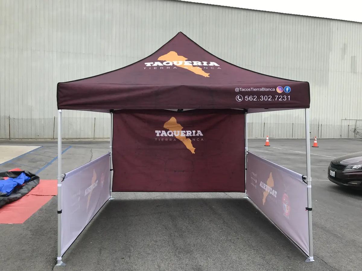 Custom printed 10x10 taqueria canopy with a printed back wall and two printed side half walls