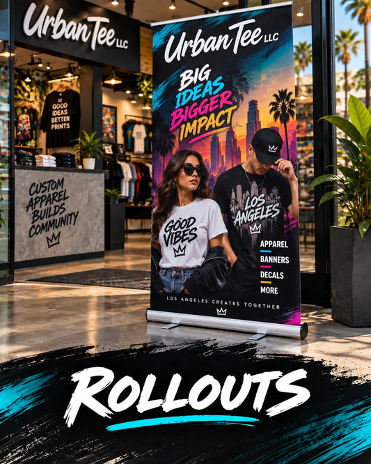 Custom retractable roll-up banner display standing at the Urban Tee LLC storefront entrance in South Gate, CA