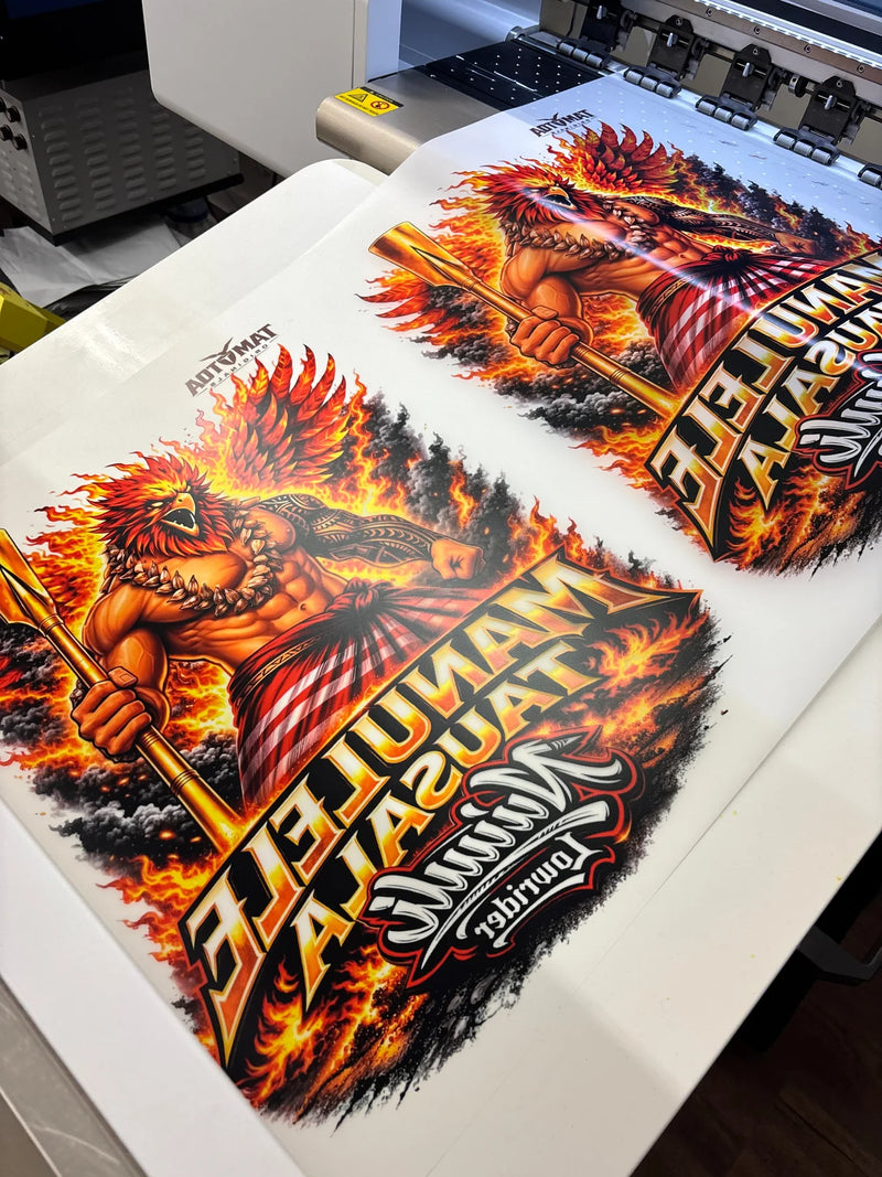 Full color DTF transfer sheet with a fiery warrior design fresh off the printer at Urban Tee LLC in South Gate, CA